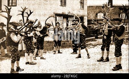 An historic newspaper photograph of Deermen (aka Deer Men) dancing the Horn Dance at Abbots Bromley, Staffordshire, England. The folk dance dates back to medieval times, though like some Morris dancing, the dance can now involve a hobby horse, Maid Marian, and a Fool. Though historical  records of the ceremony are relatively scarce,  carbon dating of the antlers used in the ceremony  date to the ceremonial aspect to the 11th century. The ceremony usually takes place on the first Sunday after 4 September. (known as Wakes Sunday) after a blessing at st Nicholas' church. Stock Photo