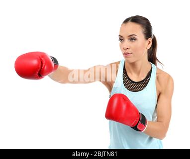 girl in gray sweatpants and top stands in a Boxing pose on a white  background. The concept of a strong woman Stock Photo - Alamy