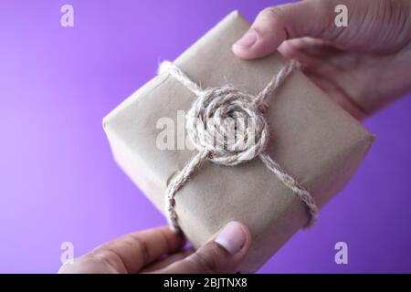 hand holding crafted paper gift boxes  Stock Photo