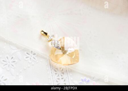 Crystal necklace on white fabric background Stock Photo
