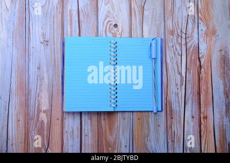 empty notepad with pencil on wooden background  Stock Photo