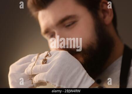 Jeweler working in workshop, closeup Stock Photo