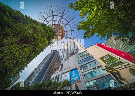 Chongqing, China -  August 2019 : Modern commercial and business skyscraper buildings containing huge shopping centre inside, the Jiefangbei district Stock Photo