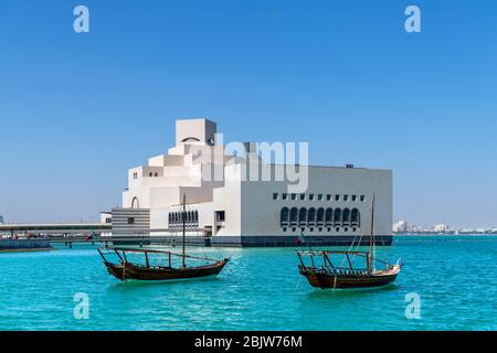The Museum of Islamic Art from MIA Park with dhows in the foreground, Doha, Qatar, Middle East