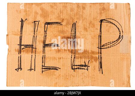 dirty rectangular flat sheet of cardboard plackard with word help, isolated on white background Stock Photo