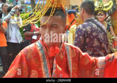 TARAKAN - INDONESIA, 25th July 2018 :portrait of young people wearing ethnic Chinese traditional clothes Stock Photo