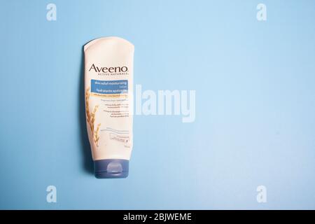 April 11, 2020- Halifax, Canada: A bottle of Aveenos oat formula moisturizer Stock Photo