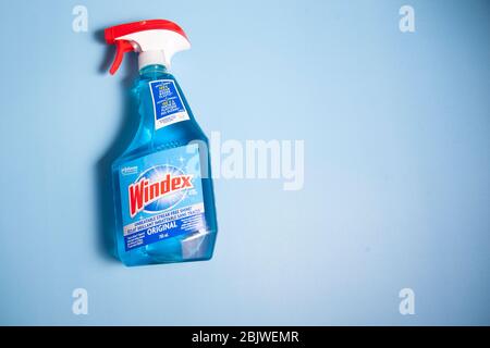 Halifax, Canada - April 11, 2020 - A bottle of blue Windex window washing spray Stock Photo