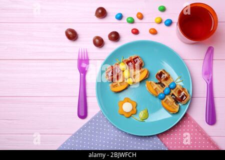 Creative breakfast for children on wooden background, top view Stock Photo