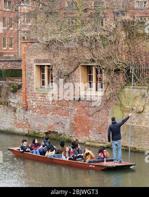 March 2018 - Japanese tourists being taken along  the river cam in a traditional wooden punt.