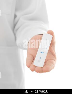 Doctor holding express test for HCV on white background Stock Photo