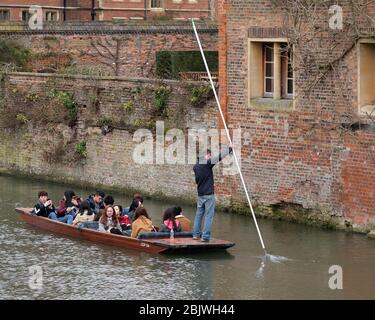 March 2018 - Japanese tourists being taken along  the river cam in a traditional wooden punt.