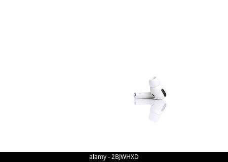 White single wireless headphone isolated over white background Stock Photo
