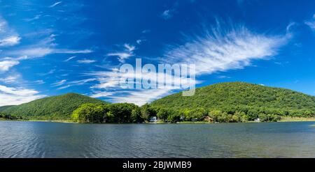 Panorama of Stissing Lake with Stissing Mountain in Pine Plains, NY Stock Photo