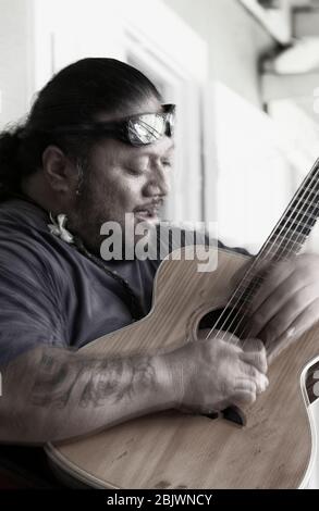 Slack key guitar hi-res stock photography and images - Alamy