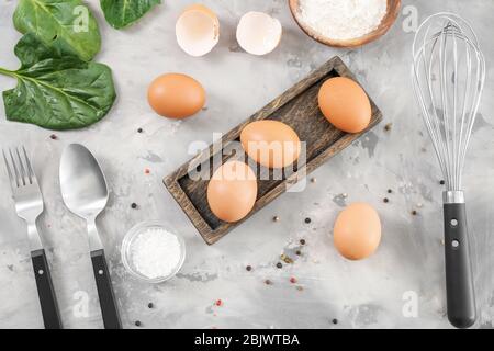 Composition with chicken eggs on table Stock Photo