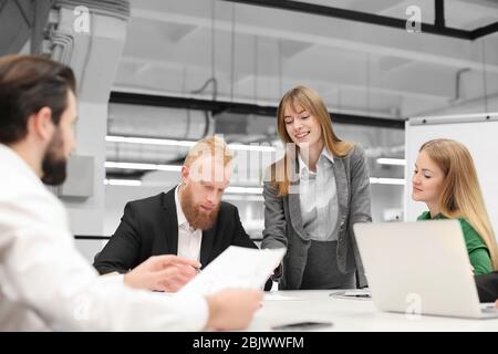 Office employees having meeting in conference room Stock Photo