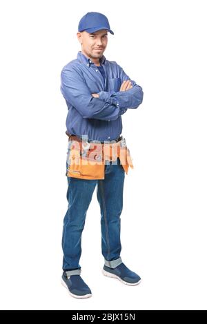 Plumber with tool belt on white background Stock Photo