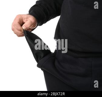 Poor man showing empty pocket on white background Stock Photo