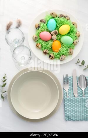 Beautiful festive Easter table setting Stock Photo