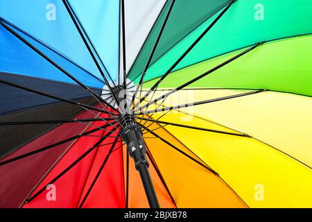 Opened rainbow umbrella, closeup Stock Photo