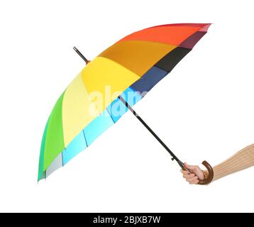 Woman holding rainbow umbrella on white background Stock Photo