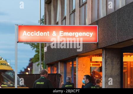Addenbrookes Hospital Cambridge, UK. 30th Apr, 2020. Staff stand outside the Accident and Emergency Department during the clap to thank staff for their work during the Covid 19 coronavirus outbreak. Credit: Julian Eales/Alamy Live News Stock Photo