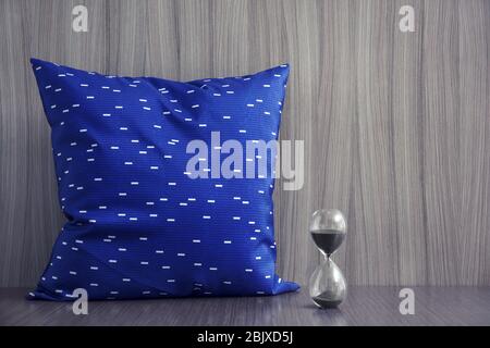 Stylish soft pillow on table Stock Photo