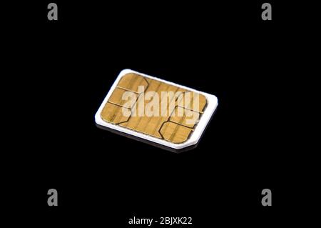 Micro GSM telecommunications identity SIM card for cell phones Stock Photo