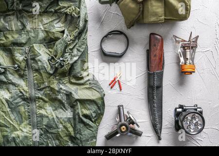 Set of items for camping on grey background Stock Photo