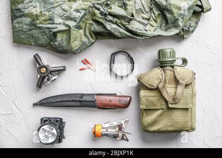 Set of items for camping on grey background Stock Photo