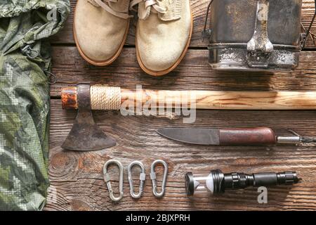 Set of items for camping on wooden background Stock Photo