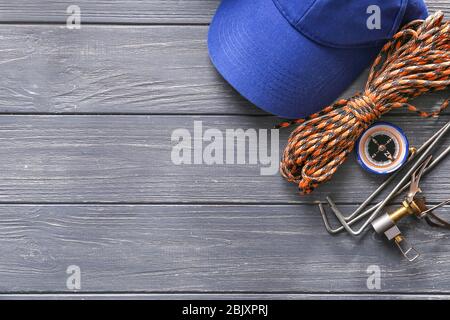 Set of items for camping on wooden background Stock Photo