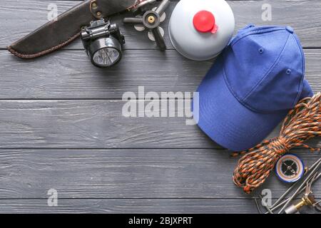 Set of items for camping on wooden background Stock Photo