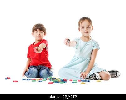 Cute little children with letters on white background Stock Photo