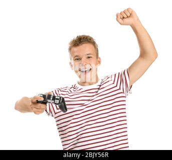 Happy teenage boy playing video game on white background Stock Photo