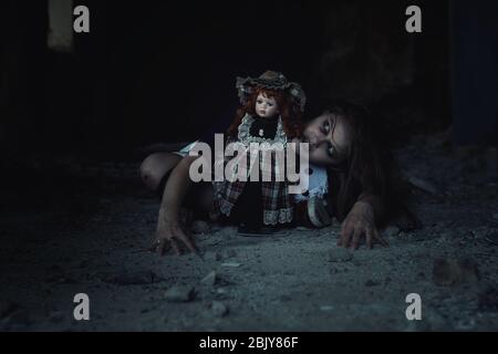 Creepy Doll In An Abandoned House. Halloween. Horror Movie. Stock Photo,  Picture and Royalty Free Image. Image 200802279.