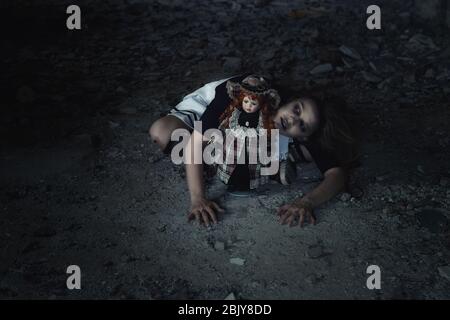 Creepy Doll In An Abandoned House. Halloween. Horror Movie. Stock Photo,  Picture and Royalty Free Image. Image 200802279.