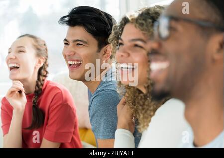 Group of friends laughing togetherÂ Stock Photo