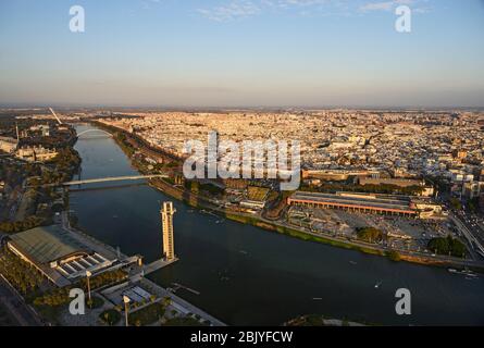 HIGH ANGLE VIEW OVER THE GUADALQUIVIR RIVER AND CITY OF SEVILLE, SPAIN Stock Photo
