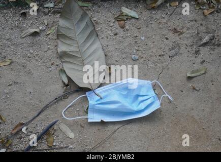 Los Angeles, California, USA 30th April 2020 A general view of atmosphere of discarded face mask on street during outbreak of Coronavirus Covid -19 pandemic and people practice social distancing during Stay At Home order on April 30, 2020 in Los Angeles, California, USA. Photo by Barry King/Alamy Stock Photo Stock Photo