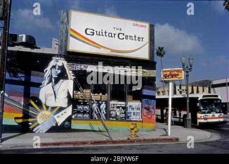 The original location of The Guitar Center with mural on Sunset Blvd. at Vista in Hollywood, CA circa 1980s. Stock Photo