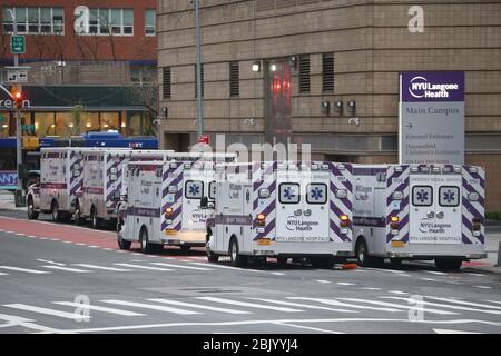April 30, 2020, New York, NY, USA: Ambulanes sit and wait to be called at  NYU Langone Hospital. (Credit Image: © Dan Herrick/ZUMA Wire) Stock Photo