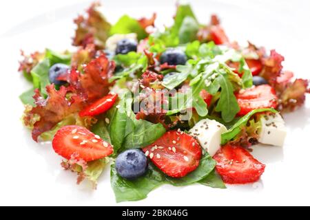 Fresh tasty salad on plate, closeup Stock Photo