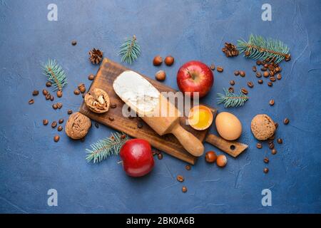 Ingredients for Christmas pie on color background Stock Photo