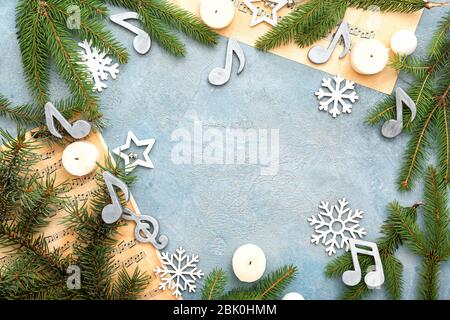 Composition with note sheets, Christmas decor and place for text on grey background Stock Photo