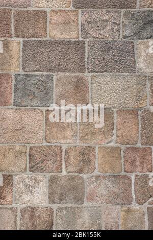 Wall of grouted stone blocks of different sizes, background, Germany Stock Photo