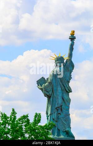 Paris, France - September 20, 2018: A replica of the iconic Statue of Liberty monument located by the Grenelle Bridge on the river Seine in Paris a cl Stock Photo
