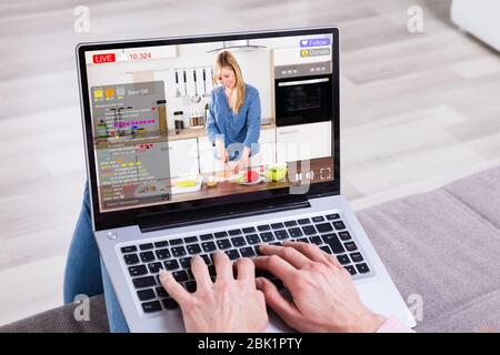 Streaming Live Cooking Internet Show On Laptop Stock Photo