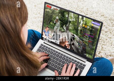 Man Streaming Multiplayer Online First Person Shooter on Pc while Gaming  Girl is Fighting in Virtual Reality Game Stock Photo - Image of headphones,  stream: 259471122